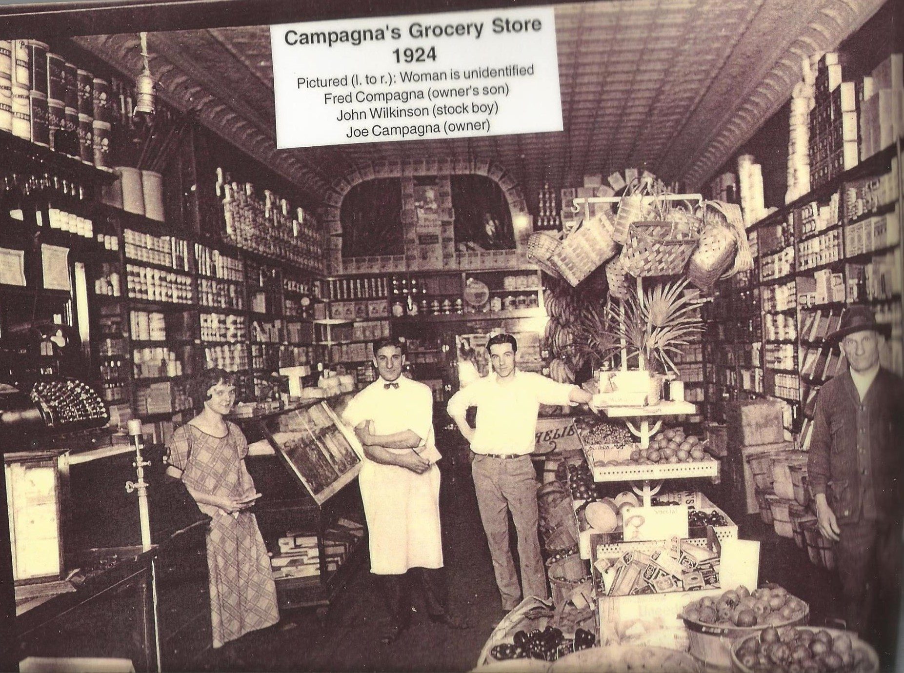 Independence, 1924. Campagna's Grocery Store. Located at 116 1st St. E. They closed in the late 1930's. Carl Randall then opened a pool hall and eventually sold ito Art Berger, who ran the smoke shop pool hall. Now occupied by Christian Life Church. This is one of the underground sites.